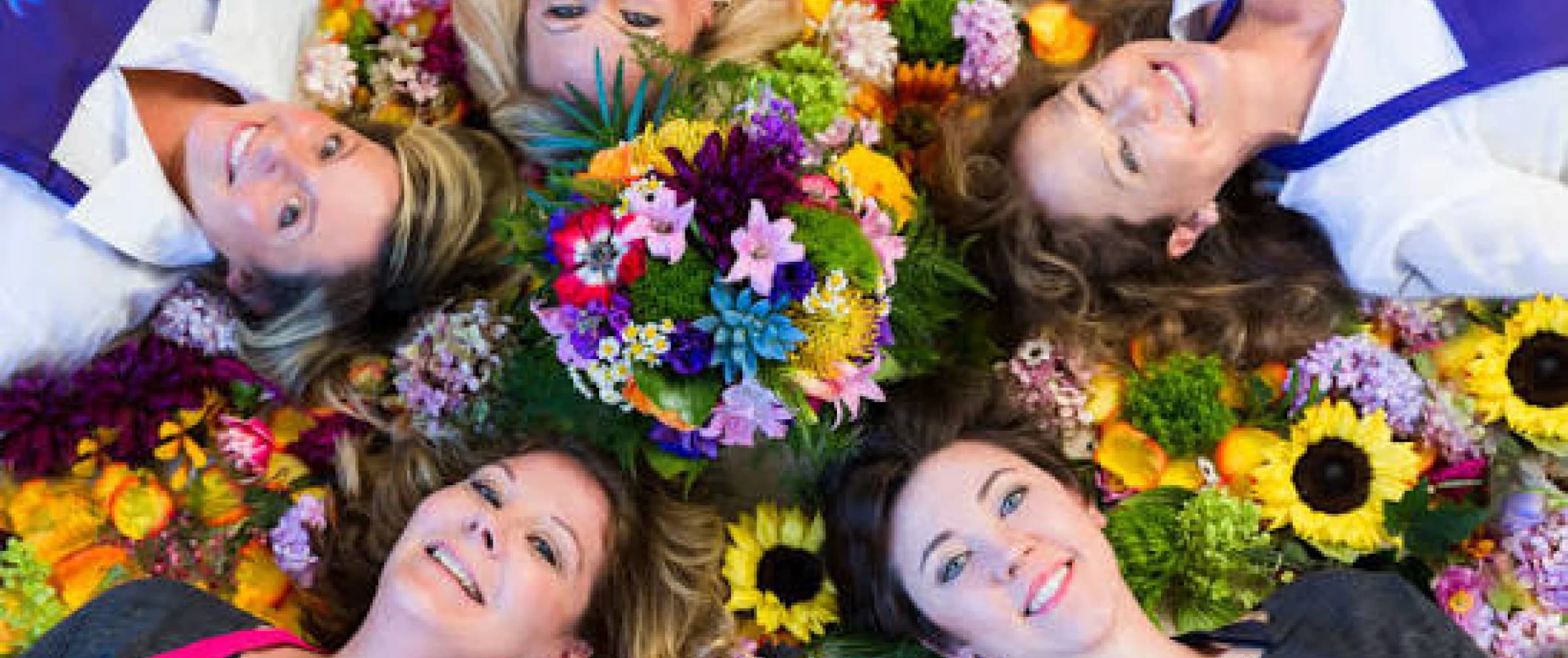 Local florists surrounded by fresh flowers